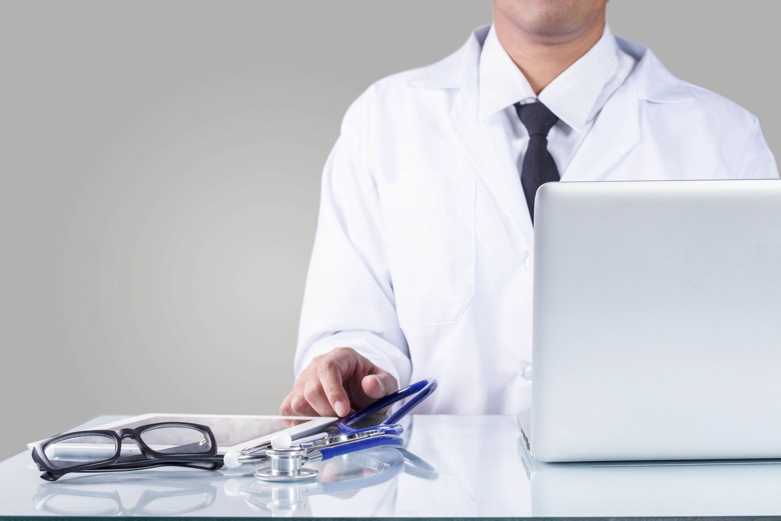 Doctor and equipment in office.
