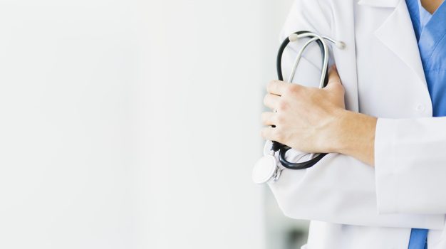 doctor holding stethoscope